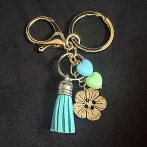 Chic Gold Keychain with Blue Tassel and Heart Charms